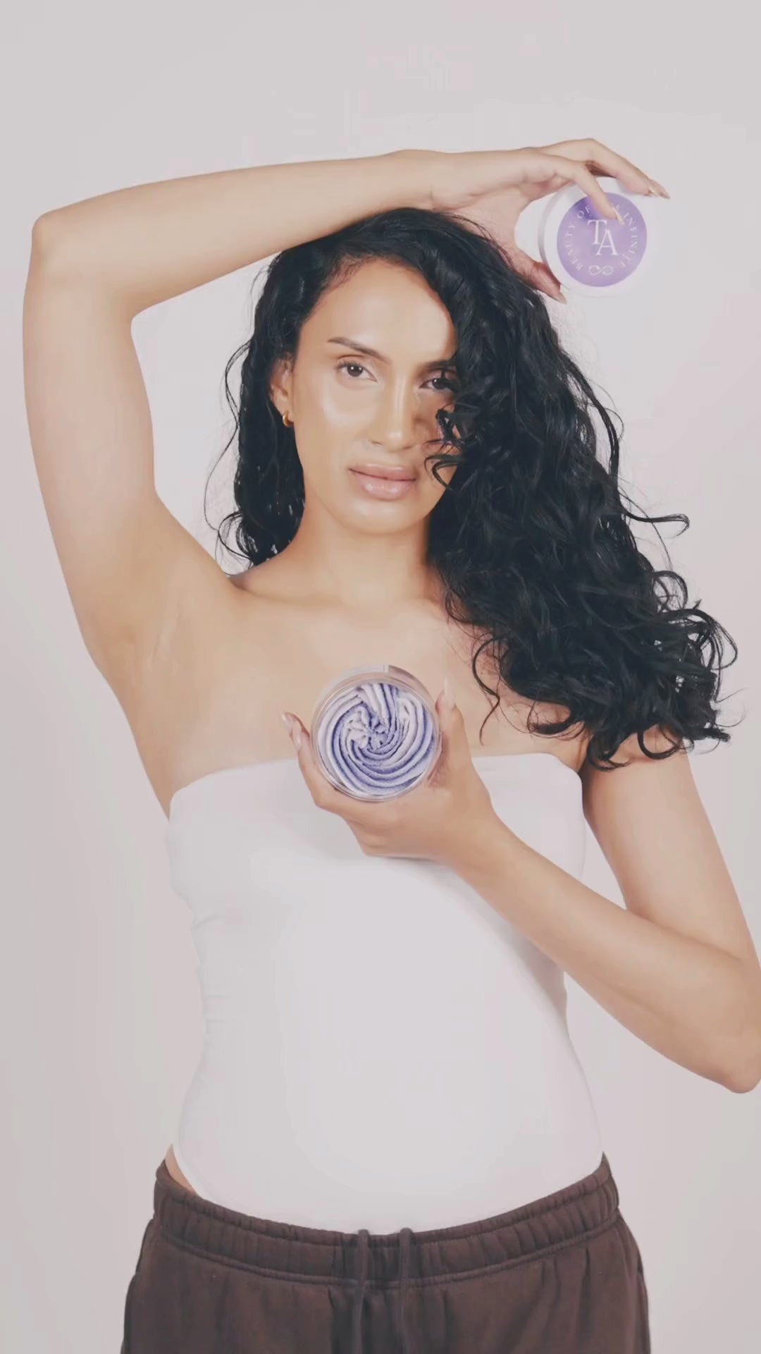 Lavender whipped body scrub video featuring model demonstrating The Arcturian luxury skincare product.